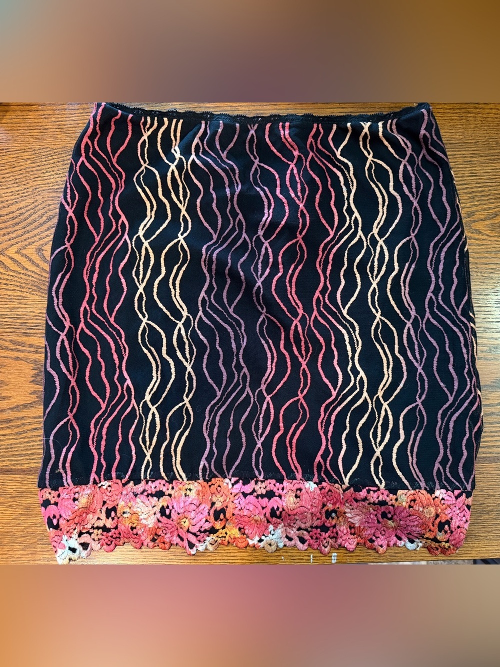 Black Embroidered Wave-Pattern Mini Skirt with Floral Trim